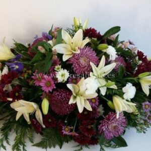 Centro mortuorio de flores variadas