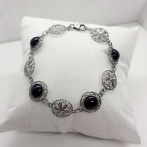 Pulsera plata y Azabache.